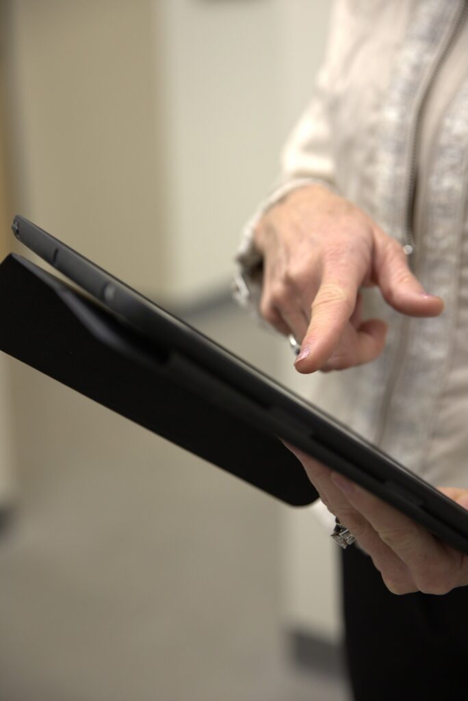 Consult with an iPad for Quantum RF at Enrichment Skin Solutions, Brooklyn Park, Minnesota.